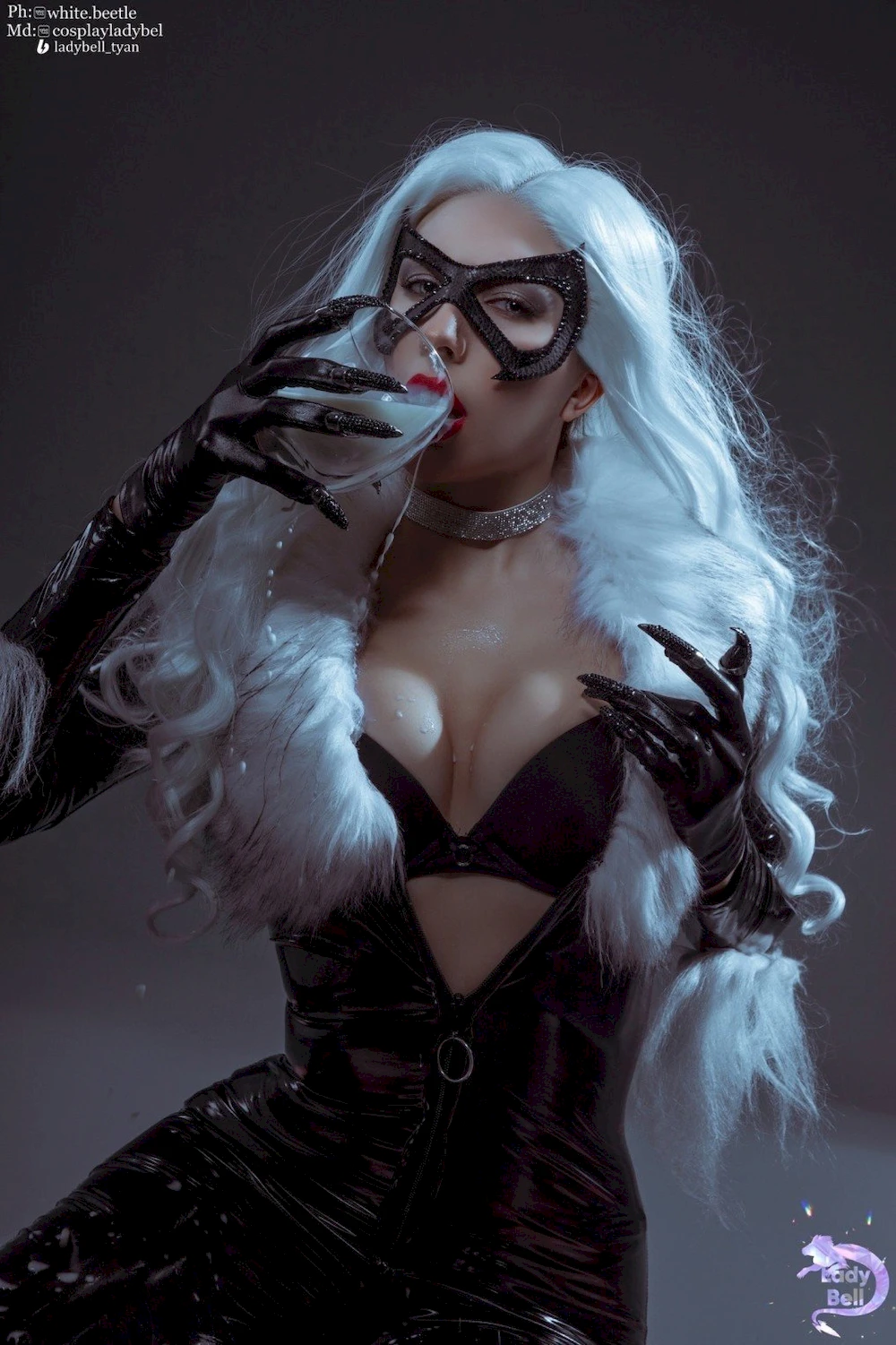 Black Marvel cat with milk on her chest: Russian cosplayer demonstrates her image #1